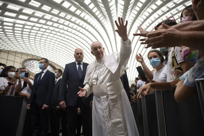 Pope Francis greets people during his general audience in the Pope Paul VI Hall Aug. 11, 2021